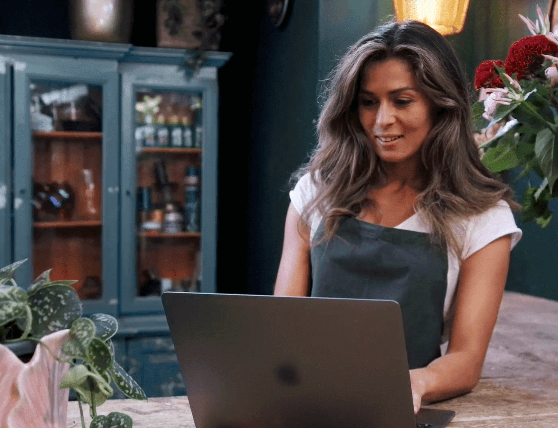 a woman working on her laptop